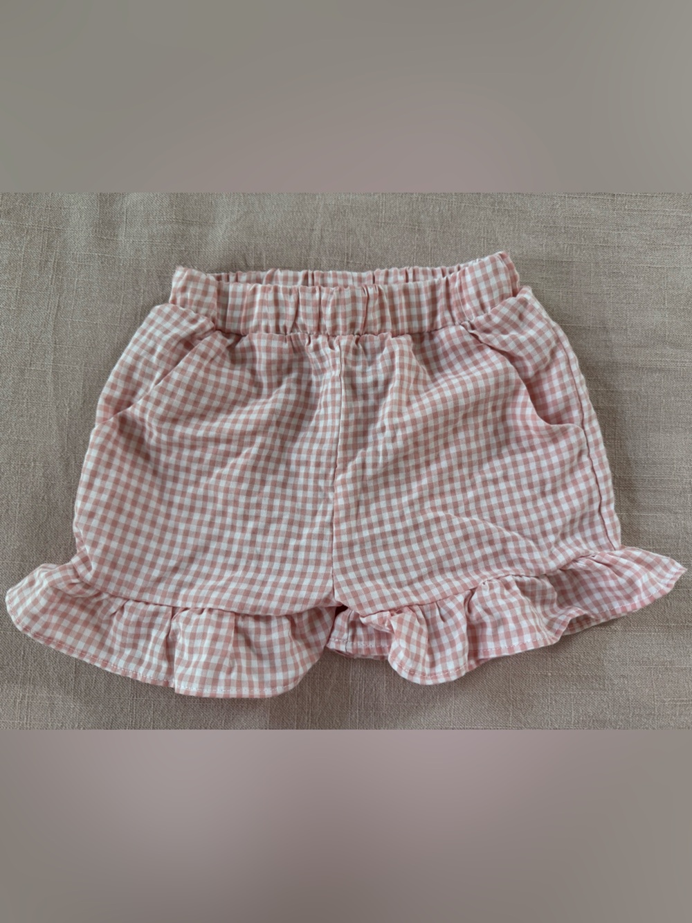 Stitchy Fish pink and white gingham ruffle shorts, size 12m